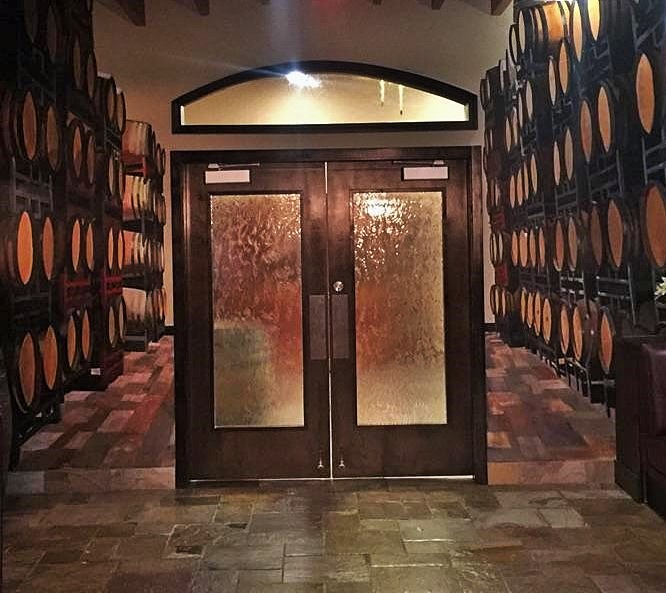 Photo courtesy Tim Morrissey. Wine cask mural gives the illusion you are in a cellar.