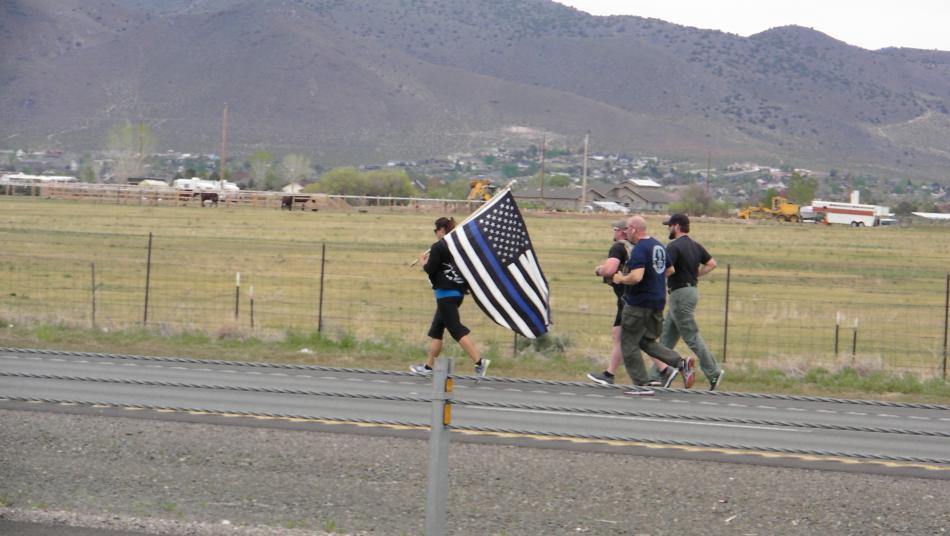 The group of law officers running through the Carson Valley ahead of the handoff.