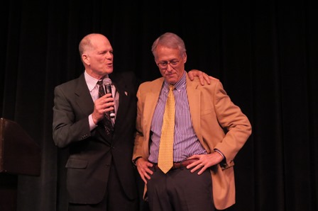 Judge John Tatro, on the right, receives the award from Judge Richard Glasson.