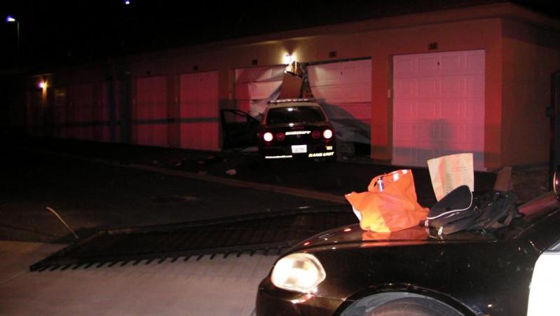 The robbery suspect slammed this Carson City sheriff's patrol car into another patrol car and then a storage unit.