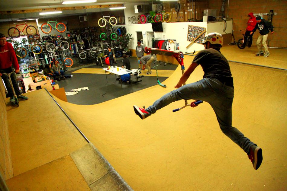 Photo courtesy The Wheel House. Team rider Tony Chavez does tricks on his scooter.