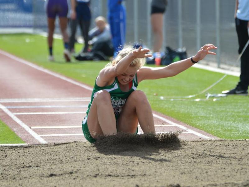 A Fallon triple jumper lands in the sand pit Friday afternoon at Carson High School.