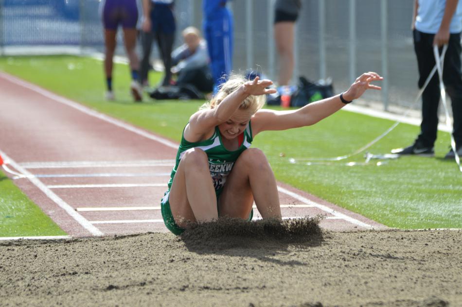 A Fallon triple jumper lands in the sand pit Friday afternoon at Carson High School.