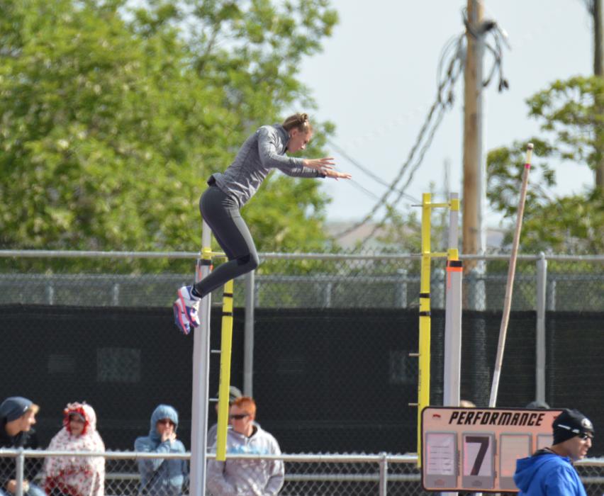 A pole vaulter practices Friday in preparation for the girls pole vault final.