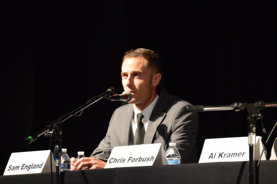Sam England answers a question Tuesday night from the moderator.