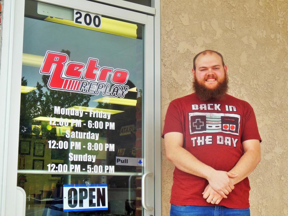 Nick Posey outside Retro Replay at 200 E. Washington Street.