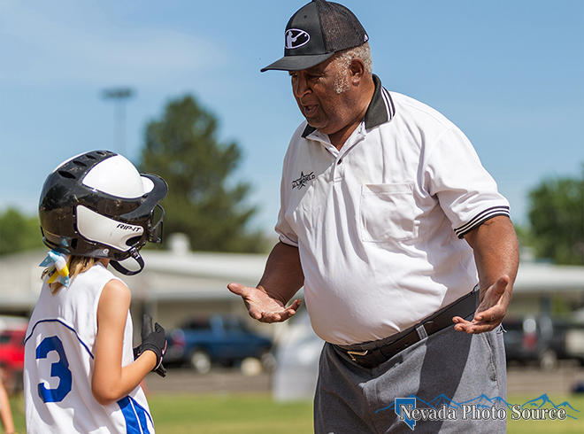 Umpire Richard Pitts works a 2015 softball tournament. Photo by Ron Harpin, Nevada Photo Source