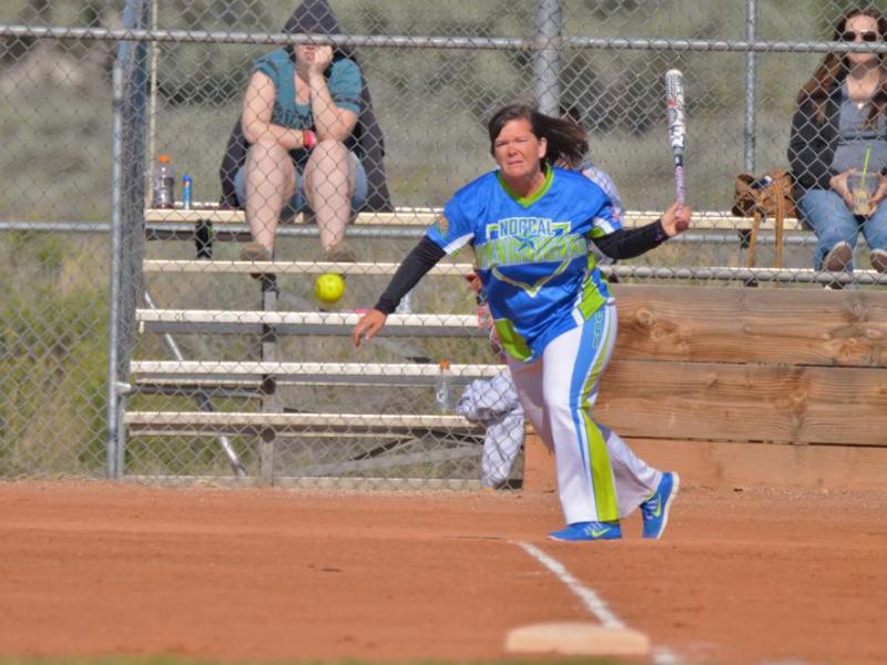A batter connects on a ground ball base hit Saturday morning at Centennial Park.