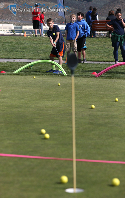 Fourth- and fifth-graders from Bordewich-Bray Elementary practice golf skills. Cathleen Allison, Nevada Photo Source