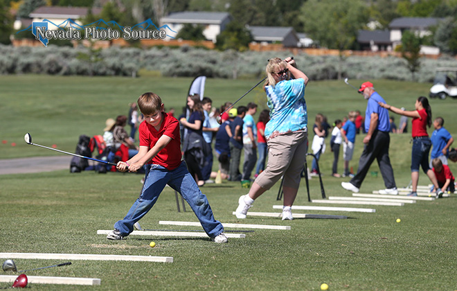 Jordan Dickens, 10, practices his golf skills at Silver Oak Golf Course in Carson City. Cathleen Allison, Nevada Photo Source
