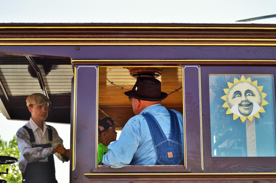 Photo by Lisa Fisher. The engineer and operations volunteers in the Glennbrook's cab.