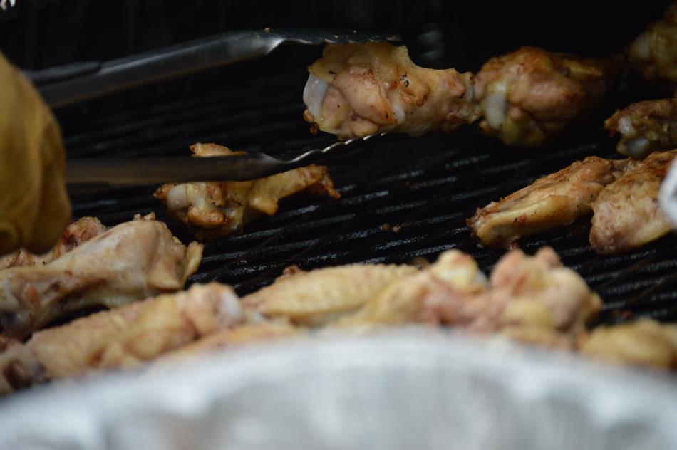 Photo by Brett Fisher. Chicken wings barbecued by The Rotary Club.