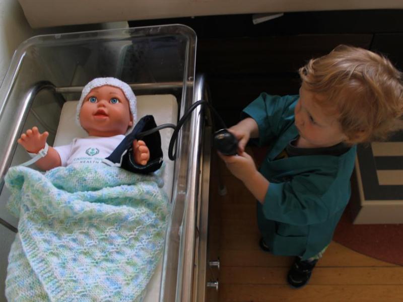 Grayson Denton, 2, at the Carson Tahoe Hospital exhibit inside the Children's Museum of Northern Nevada