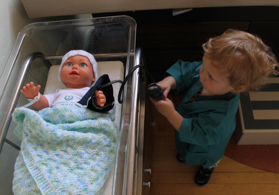 Grayson Denton, 2, at the Carson Tahoe Hospital exhibit inside the Children's Museum of Northern Nevada
