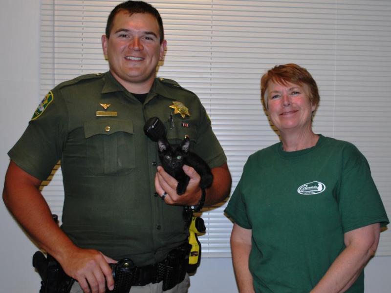 Carson City Sheriff's Office Derrick Kepler and Linda Buchanan, founder of Catmandu.