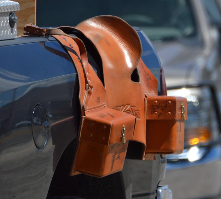 Photo by Lisa Fisher. Close up of the hand-made leather Mochila, carrying 900 pieces of mail across nearly 2,000 miles.