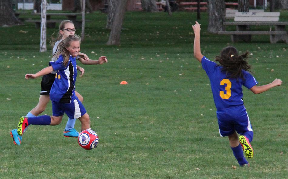 Carson Futbol Club U12 girls Boom team scrimmages in Mills Park. Photo courtesy of Miya MacKenzie