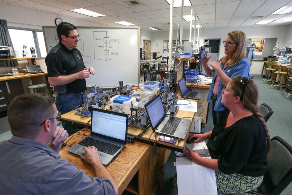 Matt Anderson, Brendan Buckley, Professor Emily Howarth and Lindsay Moore at the WNC labs. Cathleen Allison, Nevada Photo Source