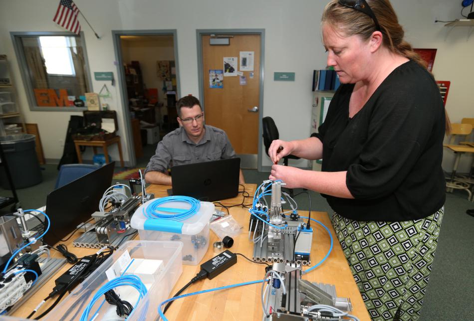 Students Matt Anderson and Lindsay Moore work in industrial technology labs at WNC. Cathleen Allison, Nevada Photo Source