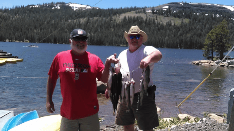 Joe Rizzo and Charles Moss with a stringer of rainbows at Caples Lake.