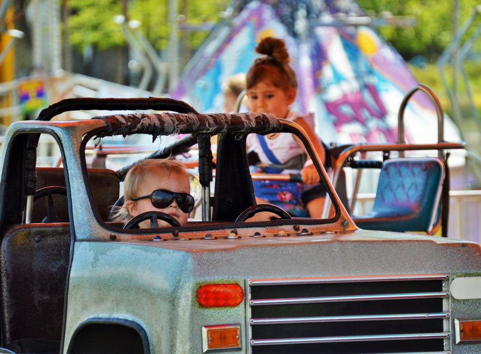 Looking cool in his truck with shades on.