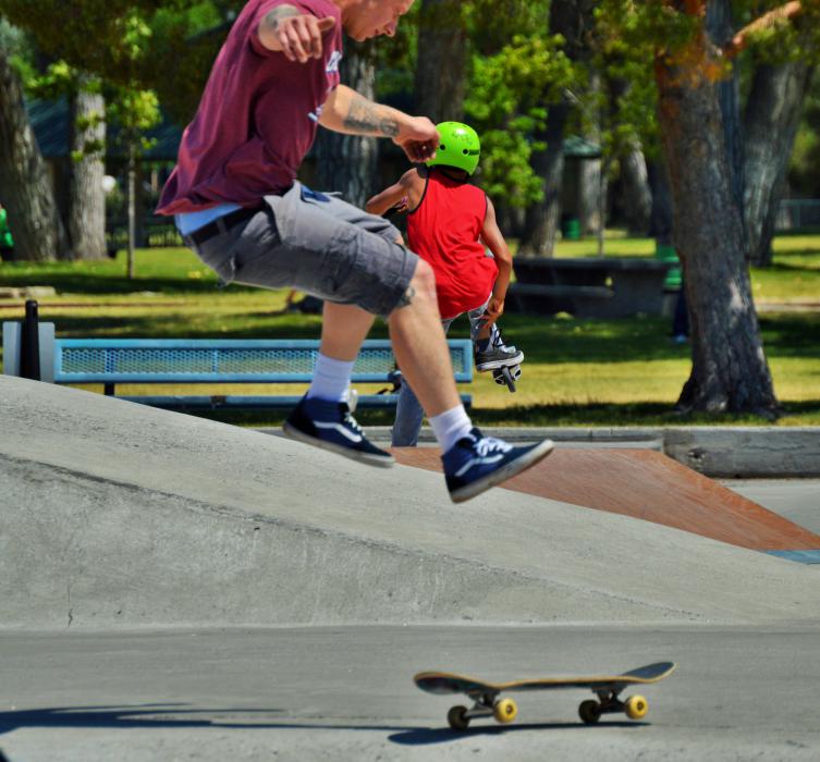 A skateboarder completes a jump during the Wheel House skate expo.