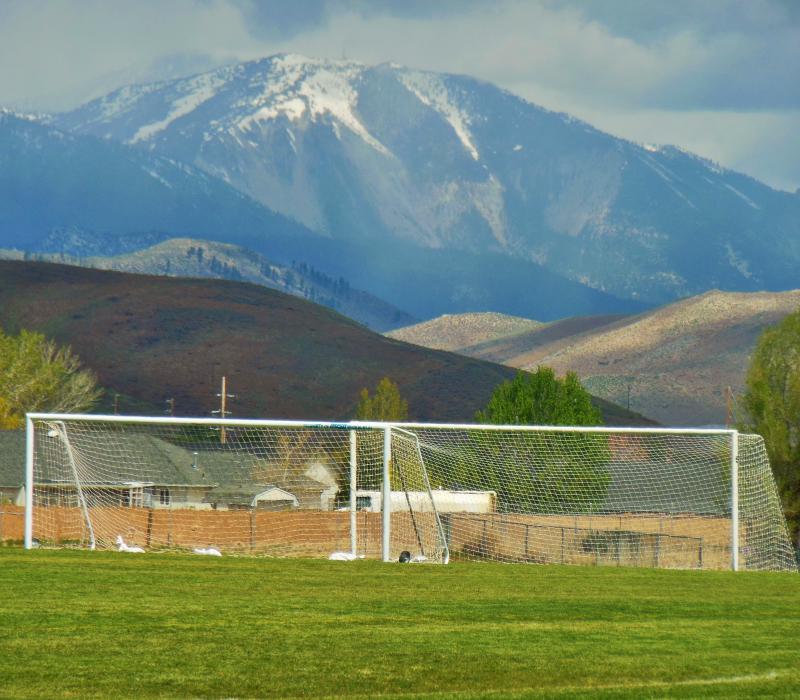 Photo by Brett Fisher. Slide Mountain looms above the soccer fields at the Pete Livermore Sports Complex.