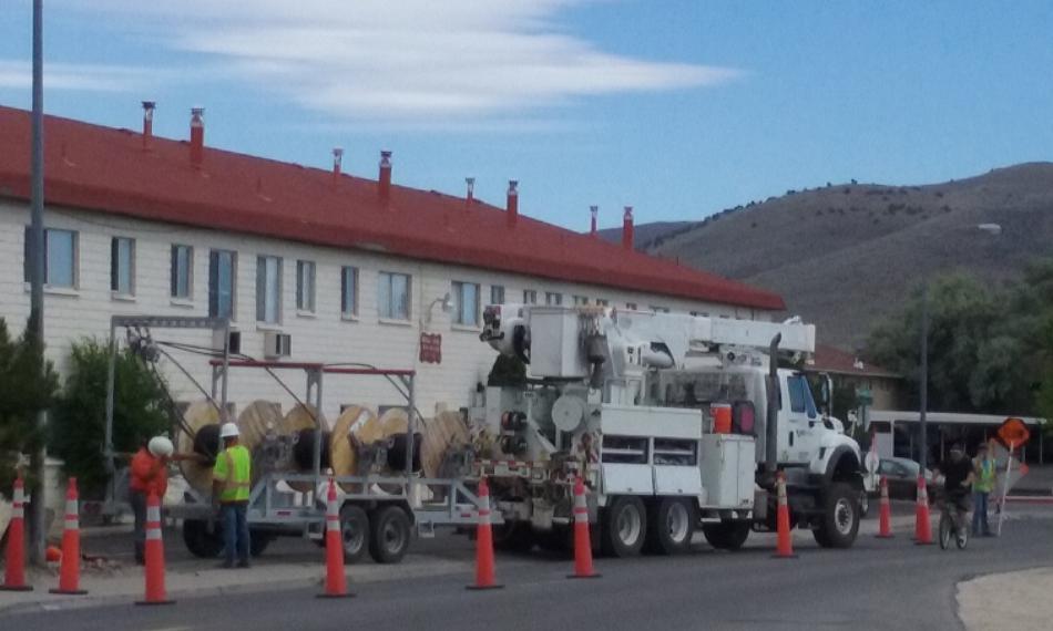 Photo by Brett Fisher. Utility crews at the apartments on N. Lompa Ln.