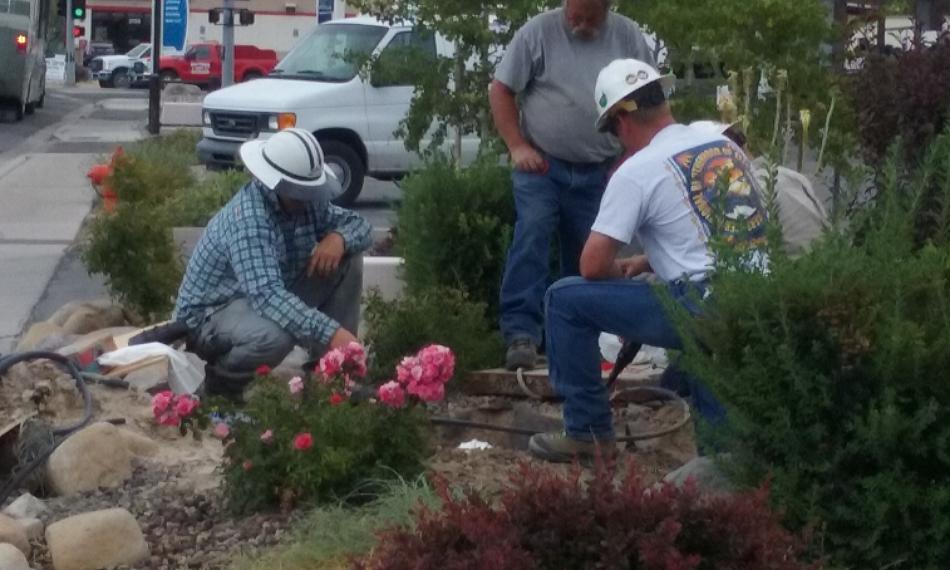 Photo by Brett Fisher. Utility crews in front of Autumn Funerals on N. Lompa Ln.