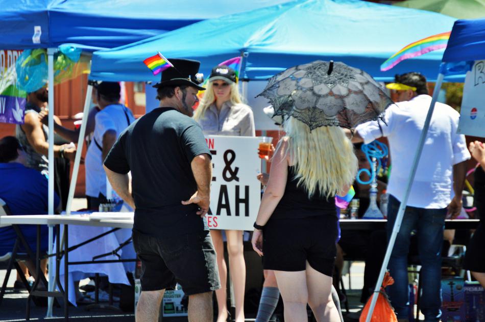 Photo by Brett Fisher. Visitors mingle at the Sassabration Festival Saturday.