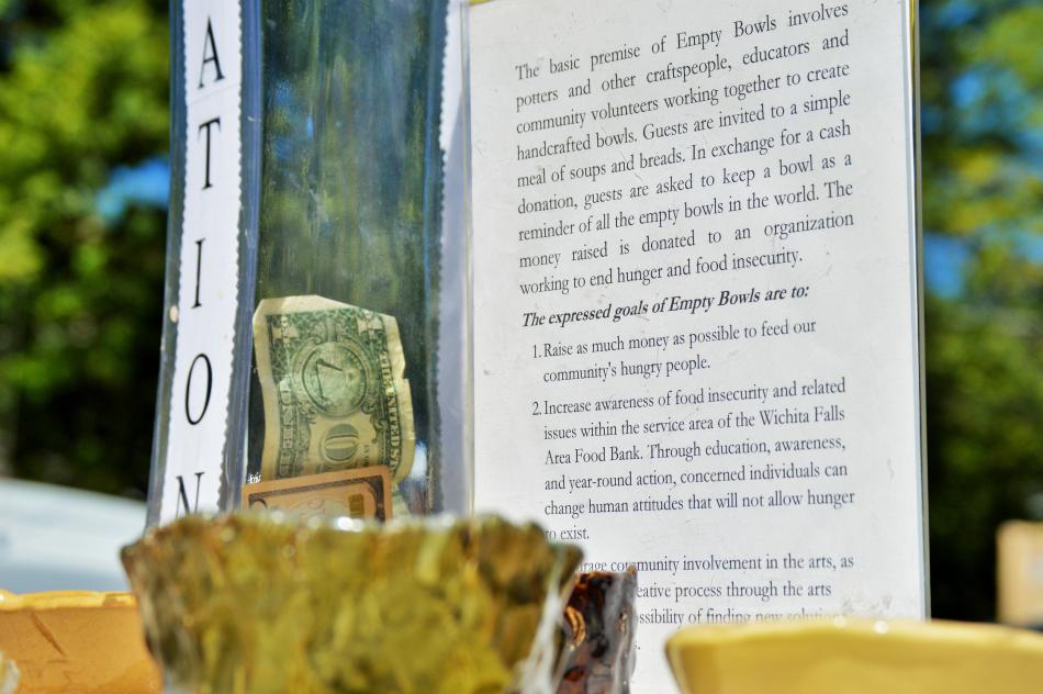Photo by Brett Fisher. The Empty Bowls story on display.