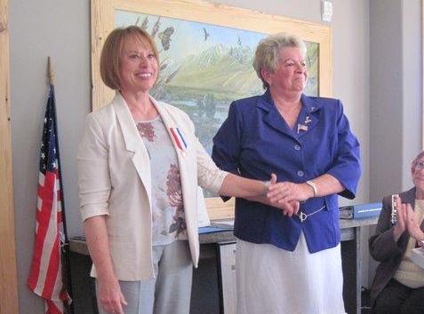Marilee Swirczek, left, is presented with a Daughters of the Revolution Medal of Honor for her contributions with "Always Lost."