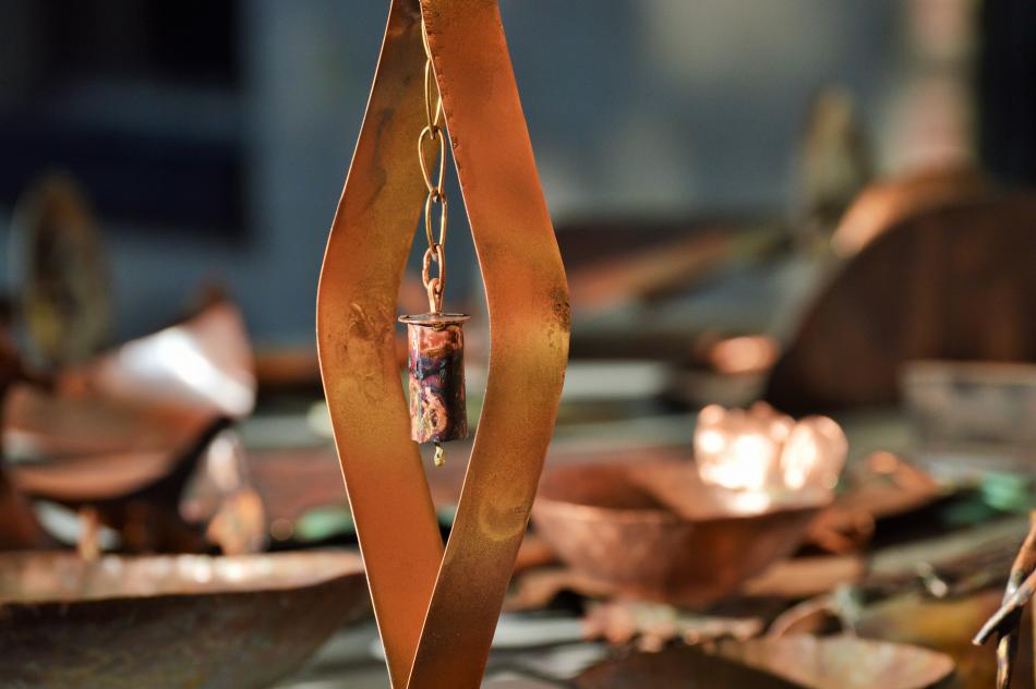 Photo by Brett Fisher. A metal chime sculpture by Jay Foremaster.