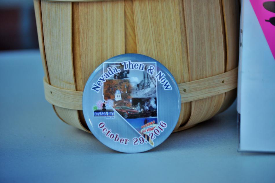 Photo by Brett Fisher. Nevada Day button displayed in front of the Nevada Day Store.