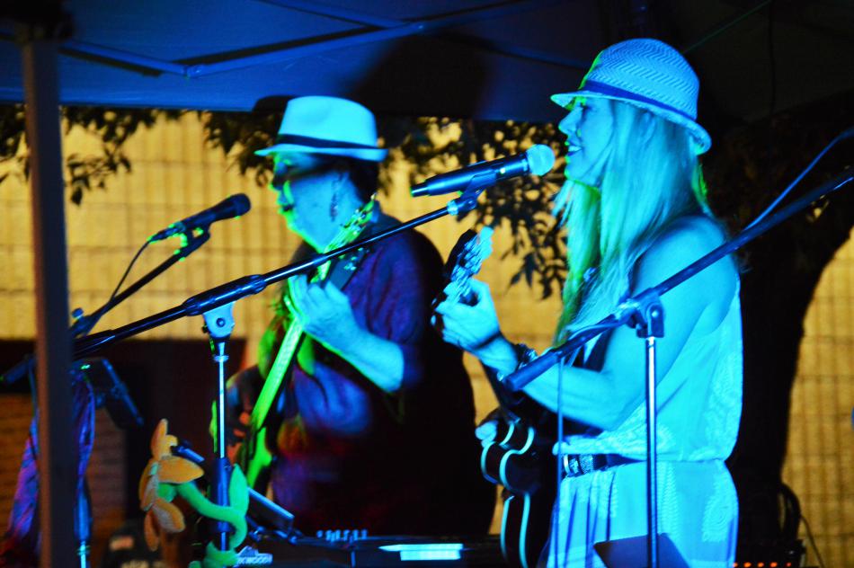 A band plays on stage in the Nugget courtyard.