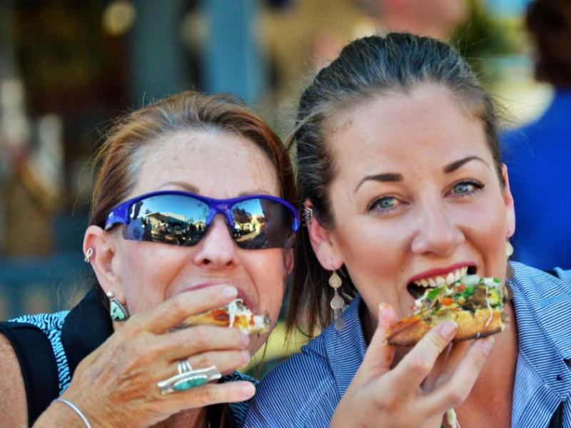 Participants eat pizza from Papa Murphy's in Telegraph Square.