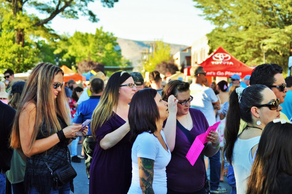 Tasters in line for food on Curry Street.