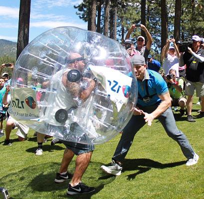 AJ Hawk and Ben Heaps prepare to tackle at the American Century Championship.