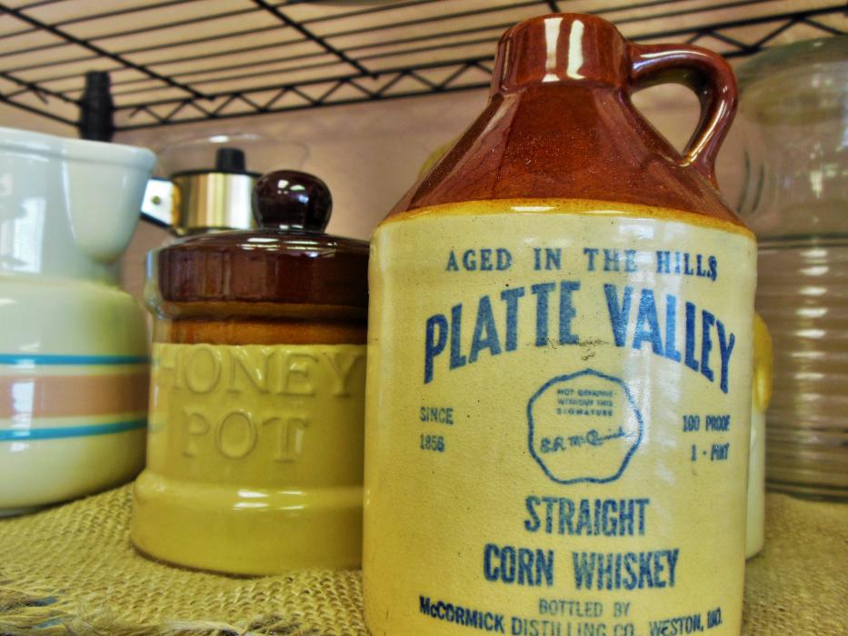 Vintage3 honey pot and corn whiskey jug.