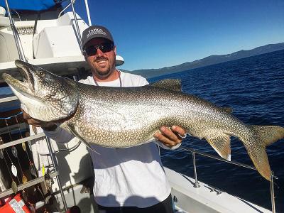 Capt. Paul Mueller of Tahoe Sport Fishing and the catch of the day.