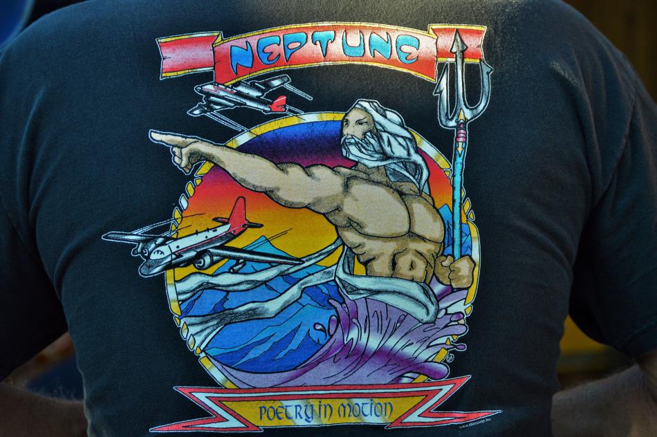 The back of a customer's t-shirt showing an air tanker support unit.