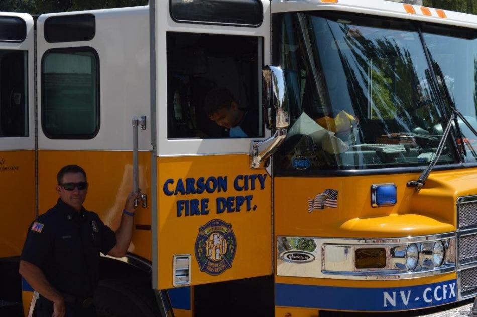 Photo by Lisa Fisher. Carson City Fire Department Engine 51 stopped by for children to explore.