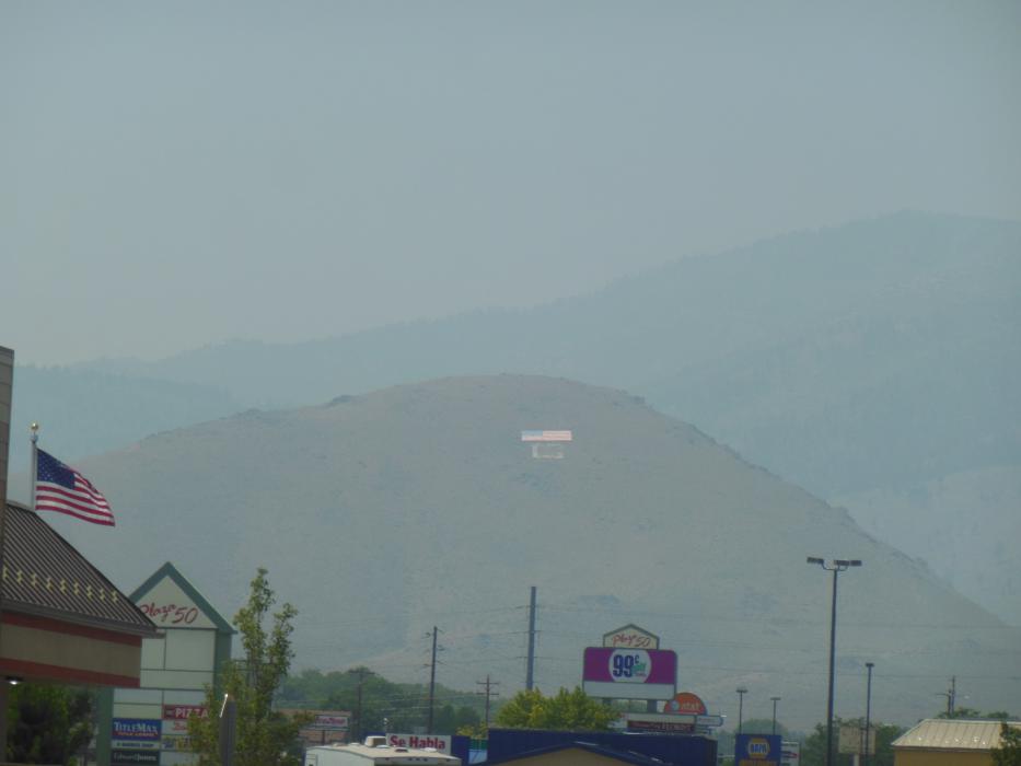Photo by Brett Fisher. C Hill is obscured by smoke that settled into Carson City.