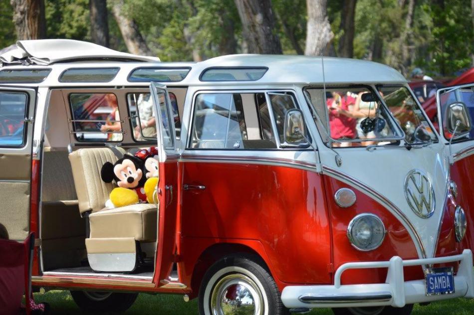 Classic Volkwagen Bus beach rig with Mickey and Minnie Mouse along for the ride.