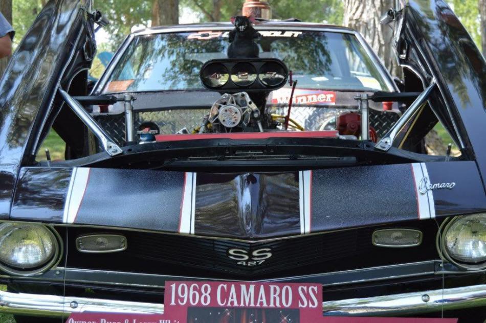A suped up Chevrolet Camaro SS with a 427 raised block engine.