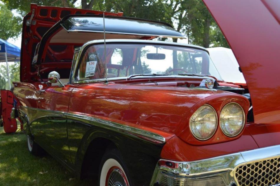 Late 1950s model Ford Fairlane with retractable solid roof that fits in the cavernous trunk.