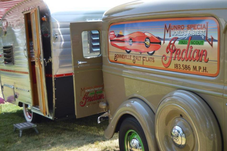 Classic panel wagon pulling a vintage camp trailer.