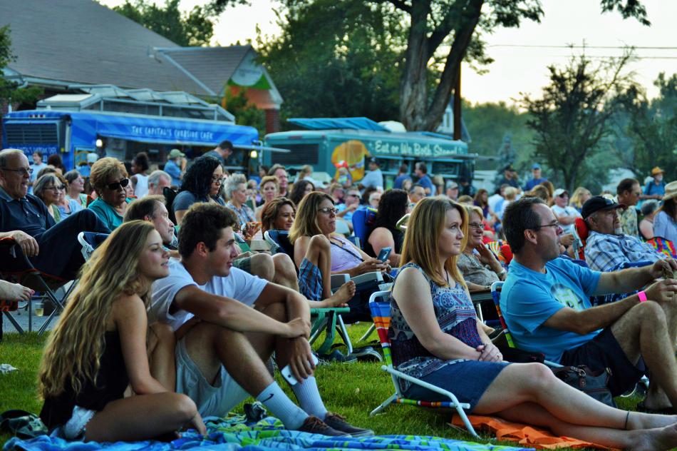 Concert-goers gather on the lawn in front of the Minnesota Street Stage.