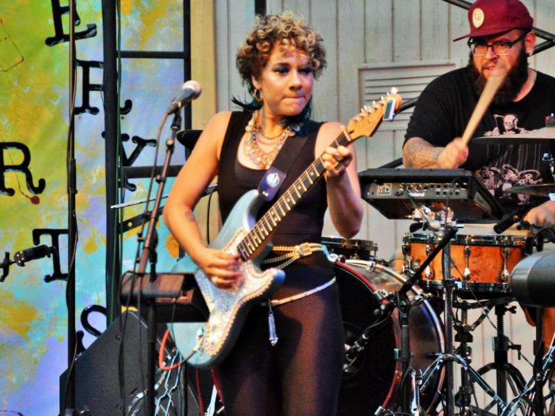 Whitney Myer performs a guitar solo Saturday night at the BAC.
