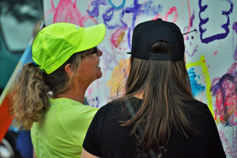 The free art wall attracts both adults and youth alike.